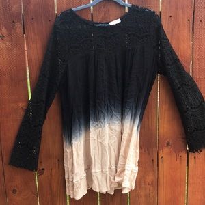 Umgee tunic top/ black with a tie dye look.